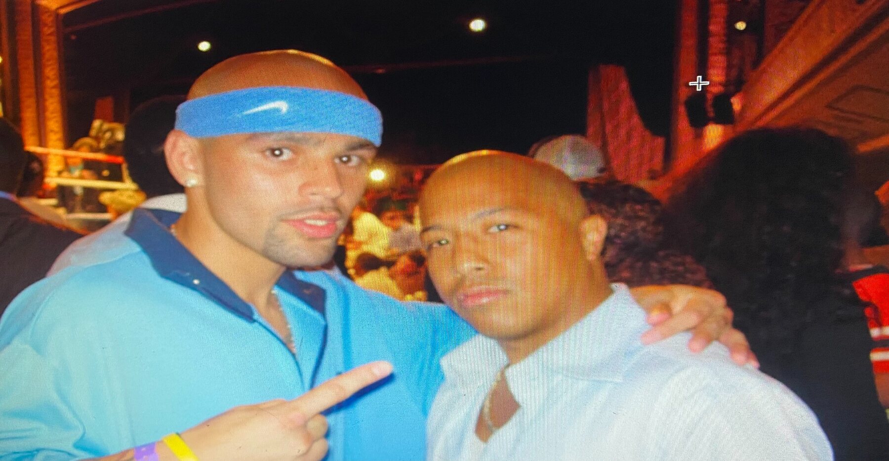 Coach Wacho with a fellow boxer at fight night