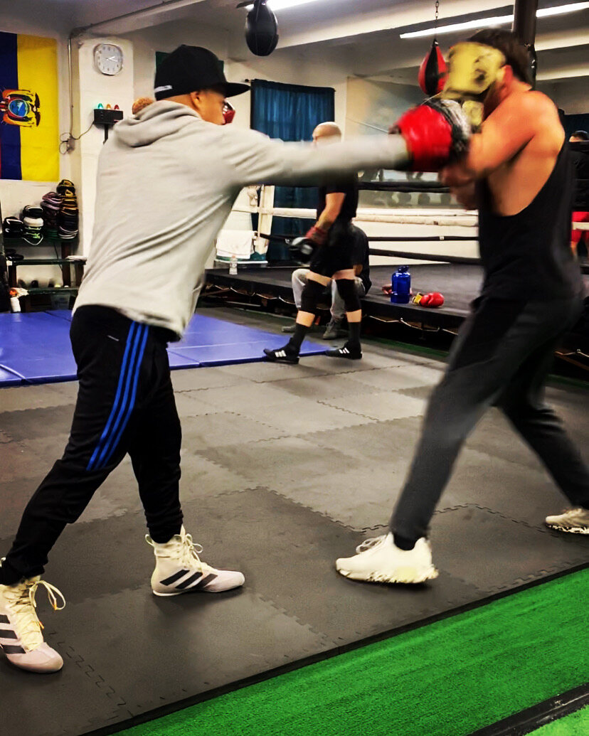 ChampionBreed mitt-work training inside the boxing gym