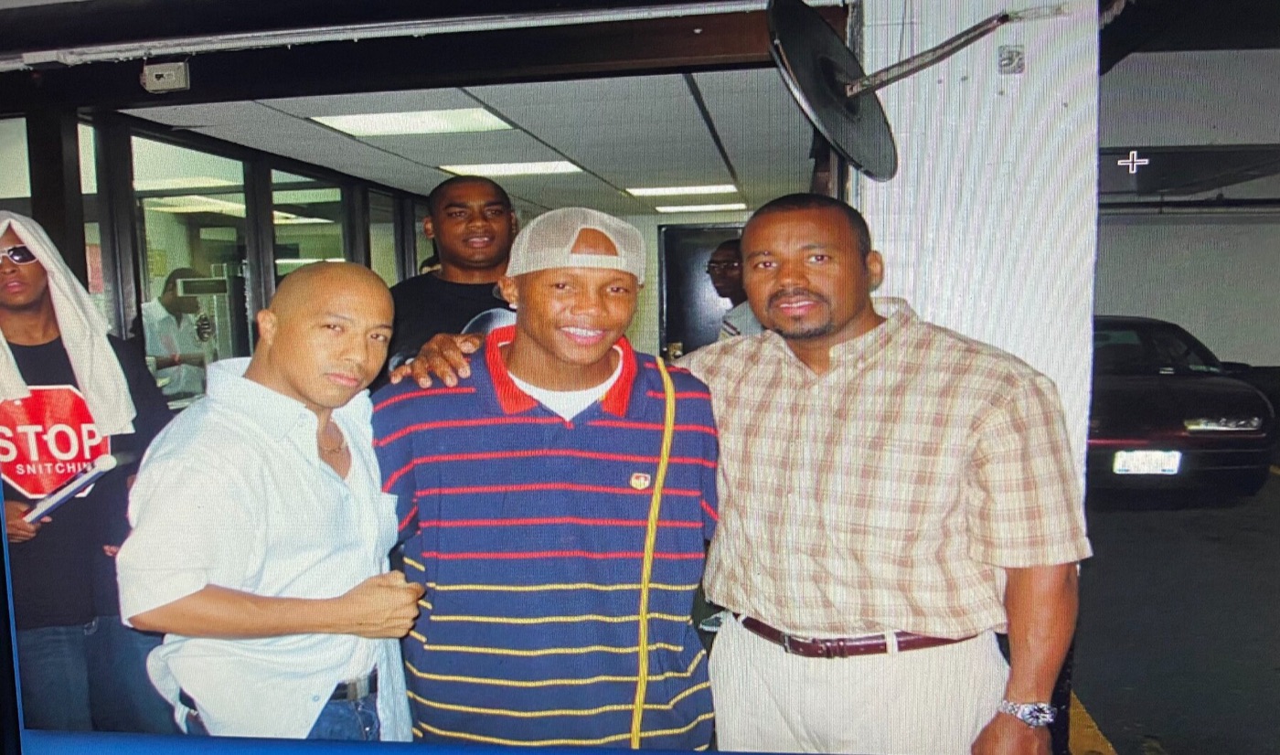 Coach Wacho with members of the boxing community